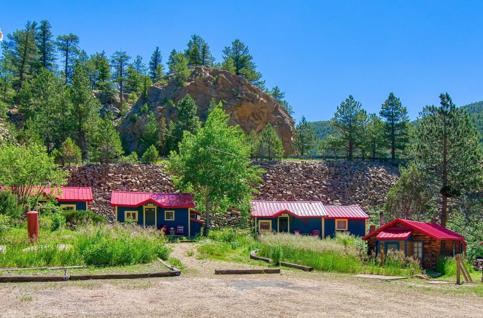 Four cozy cabins, tucked among pines by the river. Space to unwind, room to breathe, and just enough distance to feel like it’s all yours.