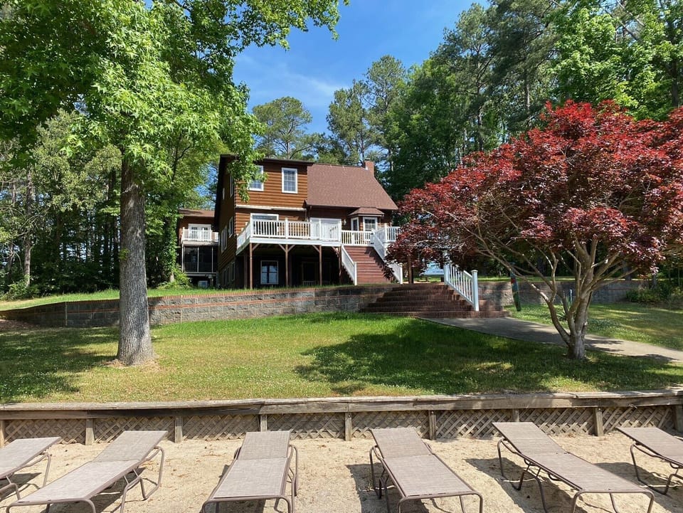 View of the back of the house from the private lakefront beach