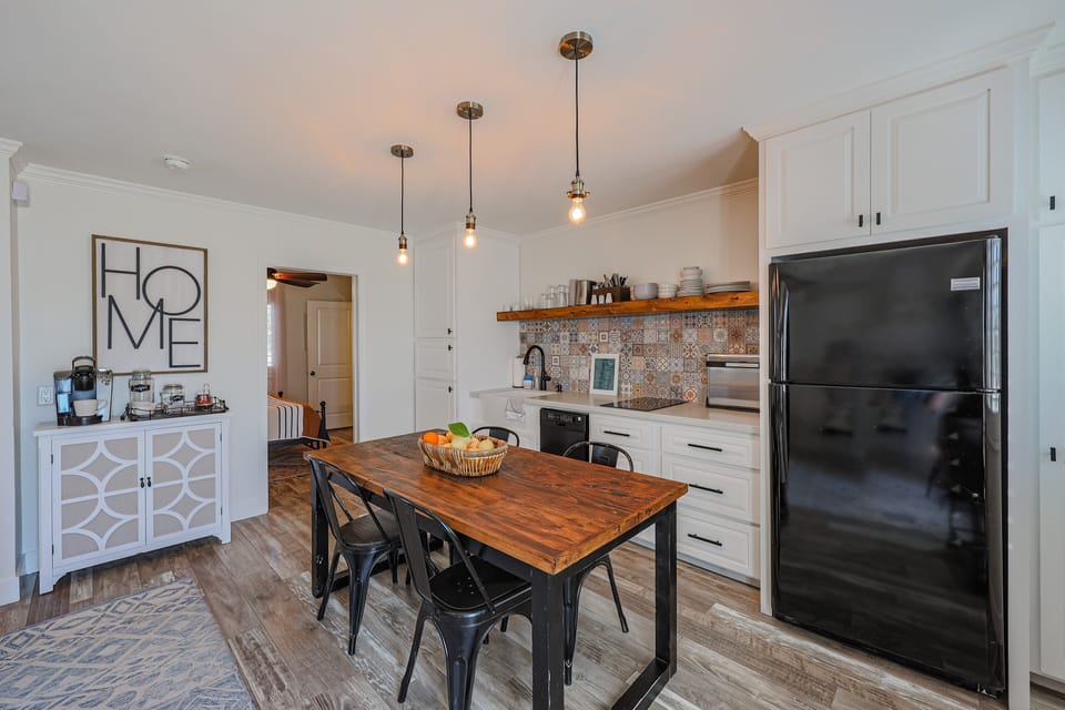 Full size refrigerator and small dishwasher for your convenience.