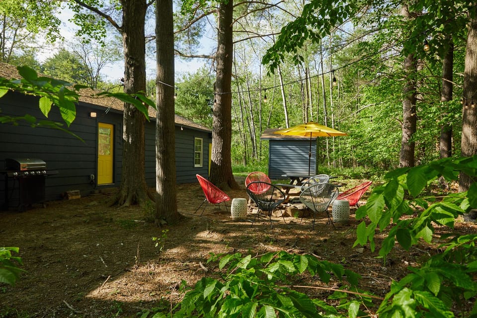 Backyard hang out area with BBQ, fire-pit, picnic table for outdoor dining. 