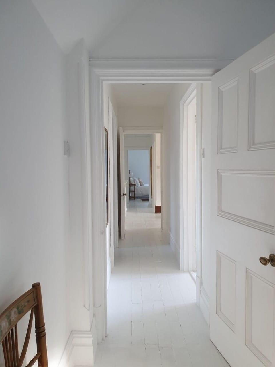 Looking down the bedroom corridor to the master bedroom