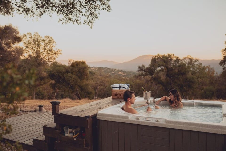 Hot tub, mountain view, glass of wine. Hard to argue with.