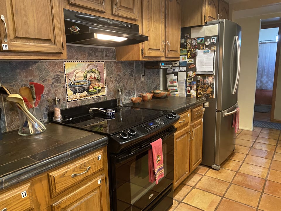 Kitchen complete with all food prep items, utensils, dishes, and appliances