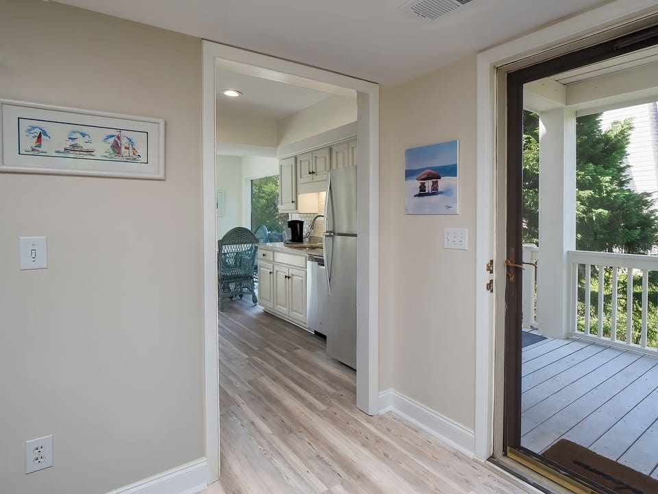 Enter through the glass front door into this bright and light filled villa.
