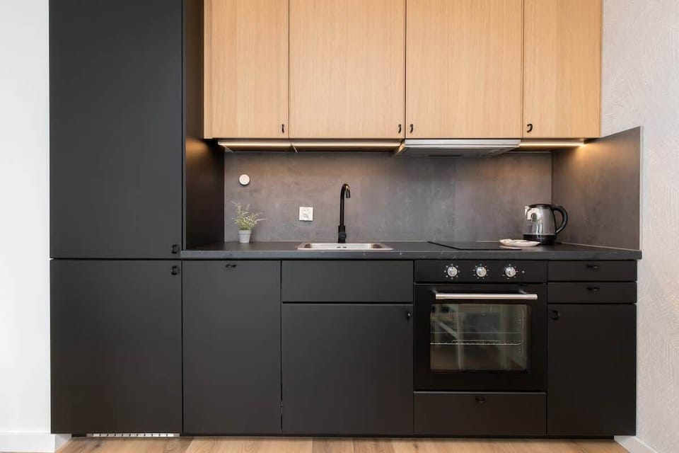 The fully equipped kitchenette includes everything you need for a home-cooked meal.