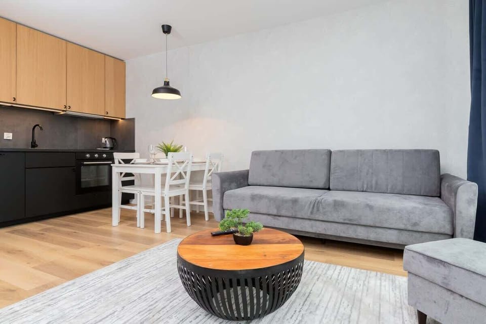 Enjoy your favorite shows on the flat-screen television in the elegant living room.