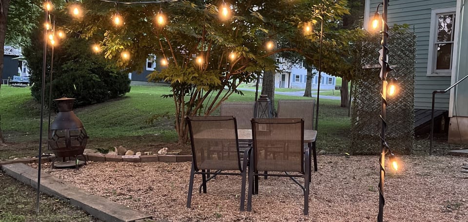 Dinning area string lights to enjoy your evening.