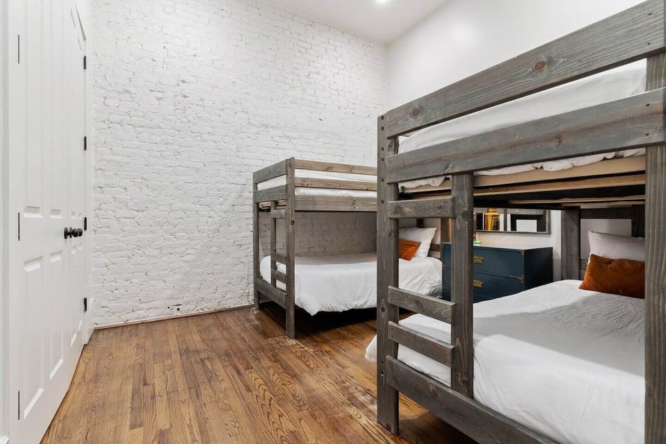 1st bedroom with  four twin bunk beds, perfect for groups 