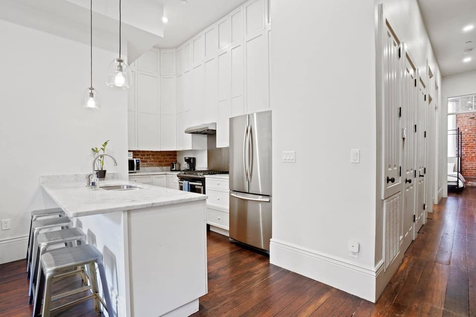 Kitchen space and the hallway leading to the bedrooms 