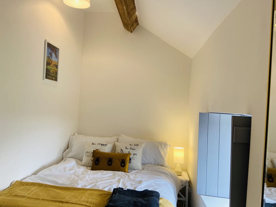 Bedroom 2 with double bed and stunning countryside views.