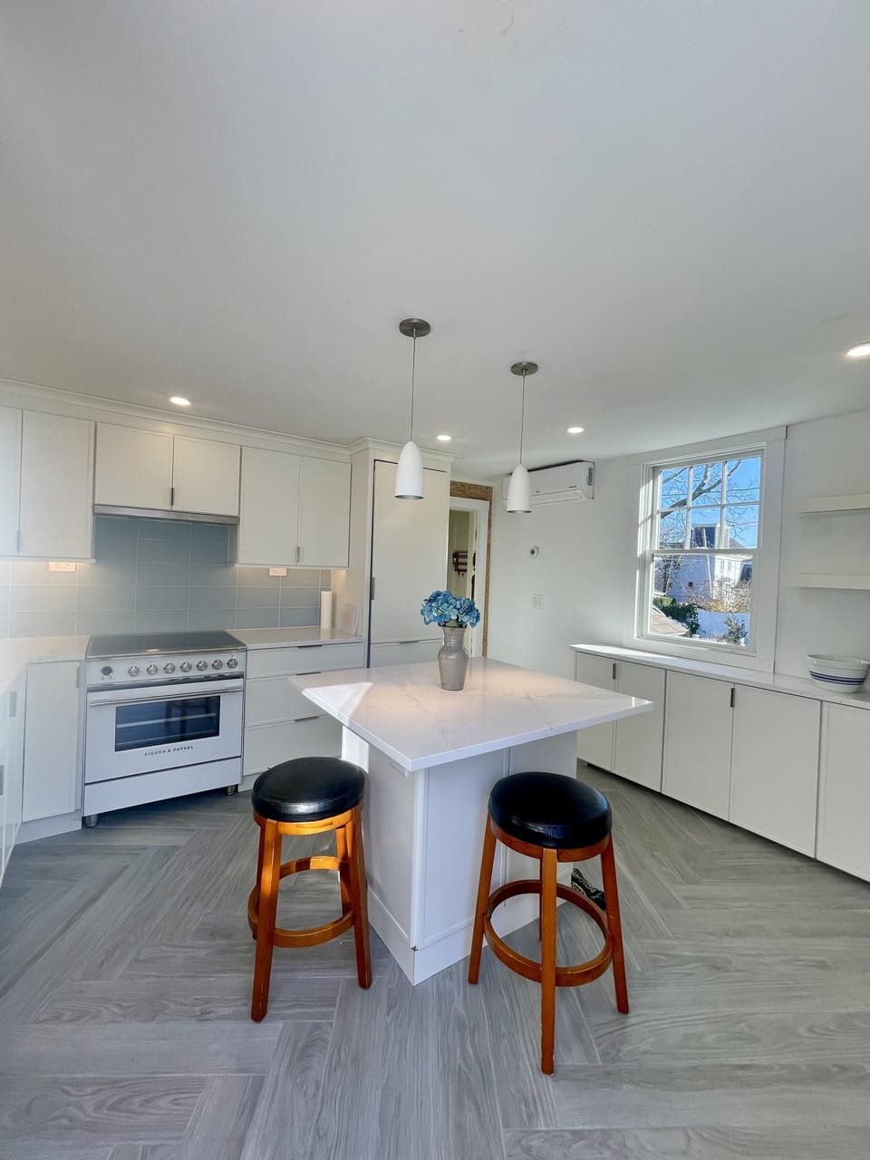 Newly renovated kitchen with integrated Fisher & Paykel appliances