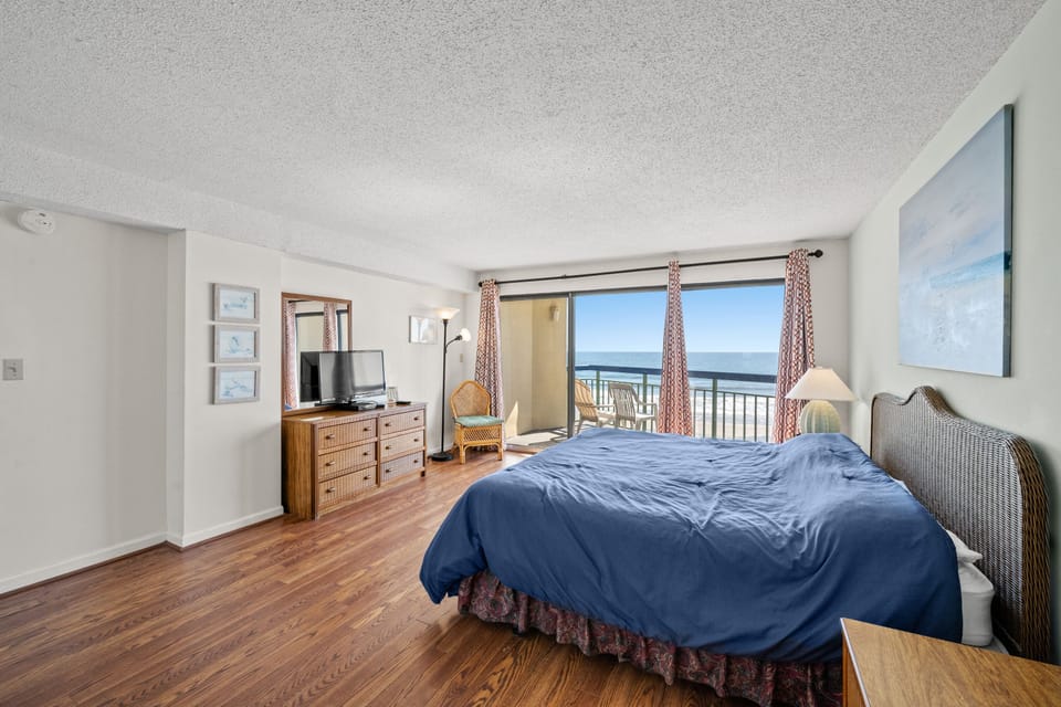 Awaken each morning to gorgeous ocean views from the primary bedroom.