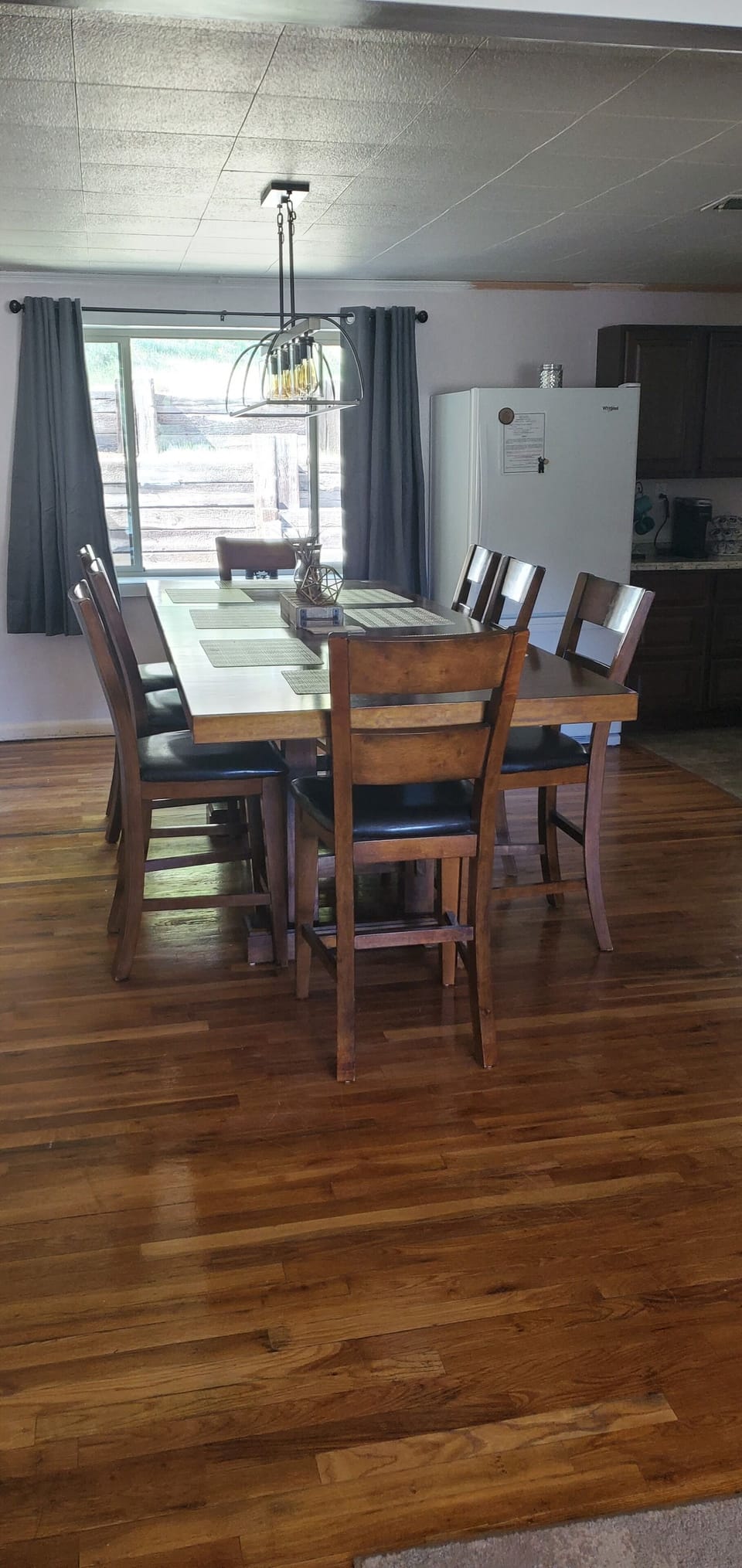 We remodeled this dining room and put in a sliding door to go out back.