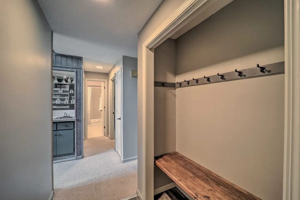 Entry way with sitting area & plenty of space for coats etc