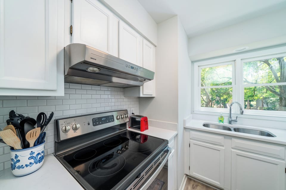 Custom cabinets and subwat tiled backsplash