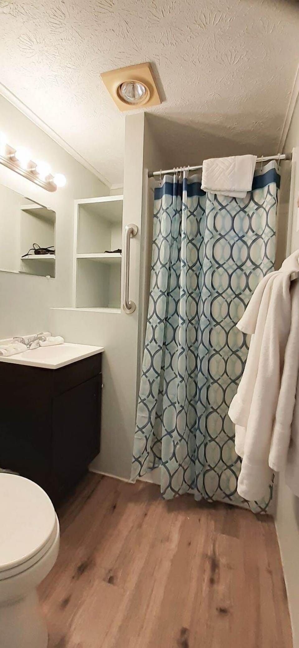 Bathroom has a stand-up shower and is fully stocked with towels and complimentary soap and shampoo for your stay