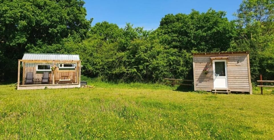 Cabin to the left , private toilet and shower to the right