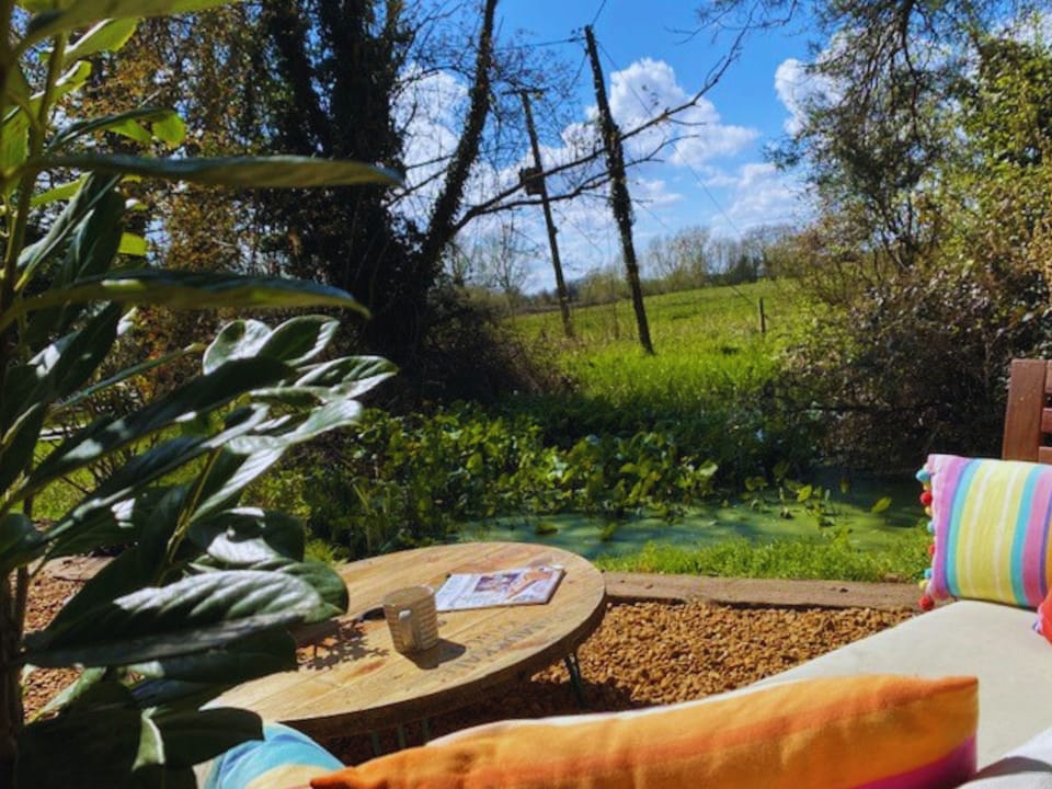 Relaxing outdoor area overlooking the pond