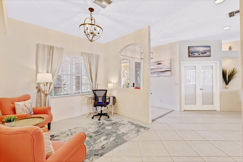The remote working area with desk + chair is set in the Living area