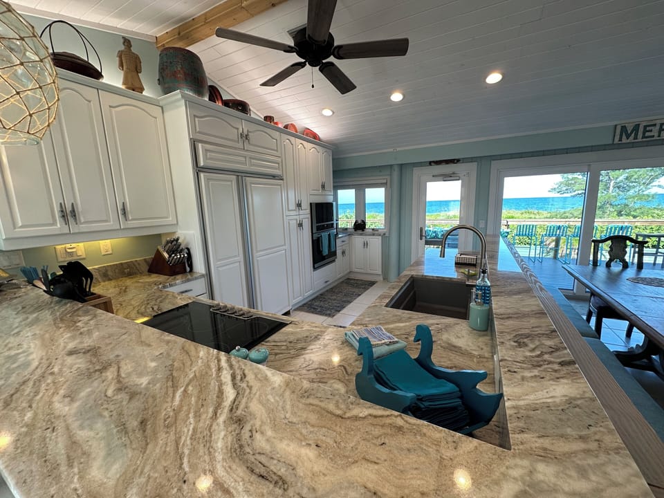 Enjoy a Stunning Sunrise Over the Ocean as You Prepare Breakfast at Sea Turtle!