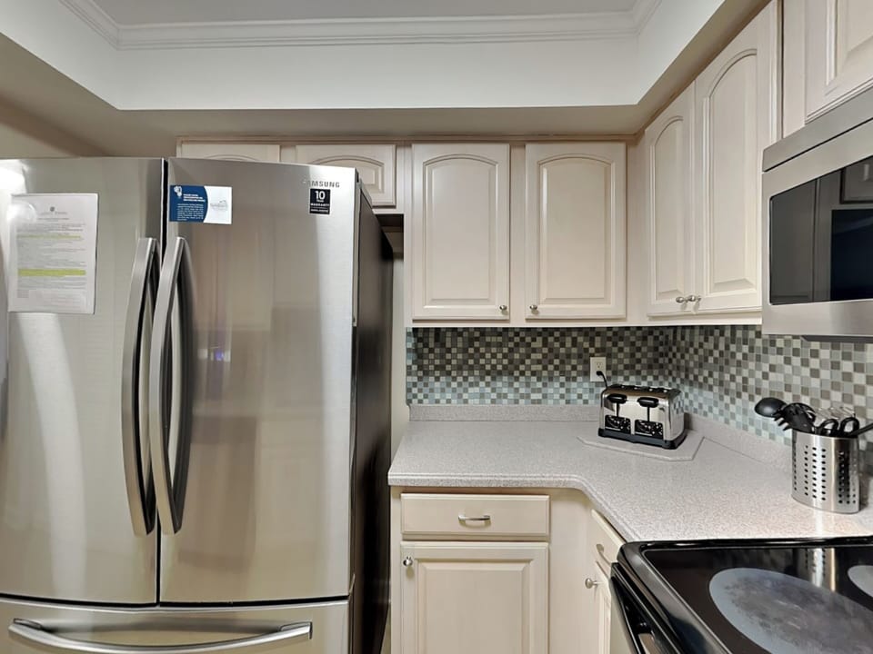 Fully Equipped Kitchen with Stainless Steel Appliances