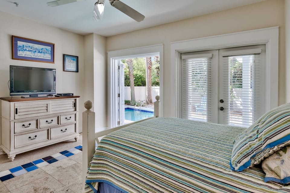 Ground level bedroom off of the pool