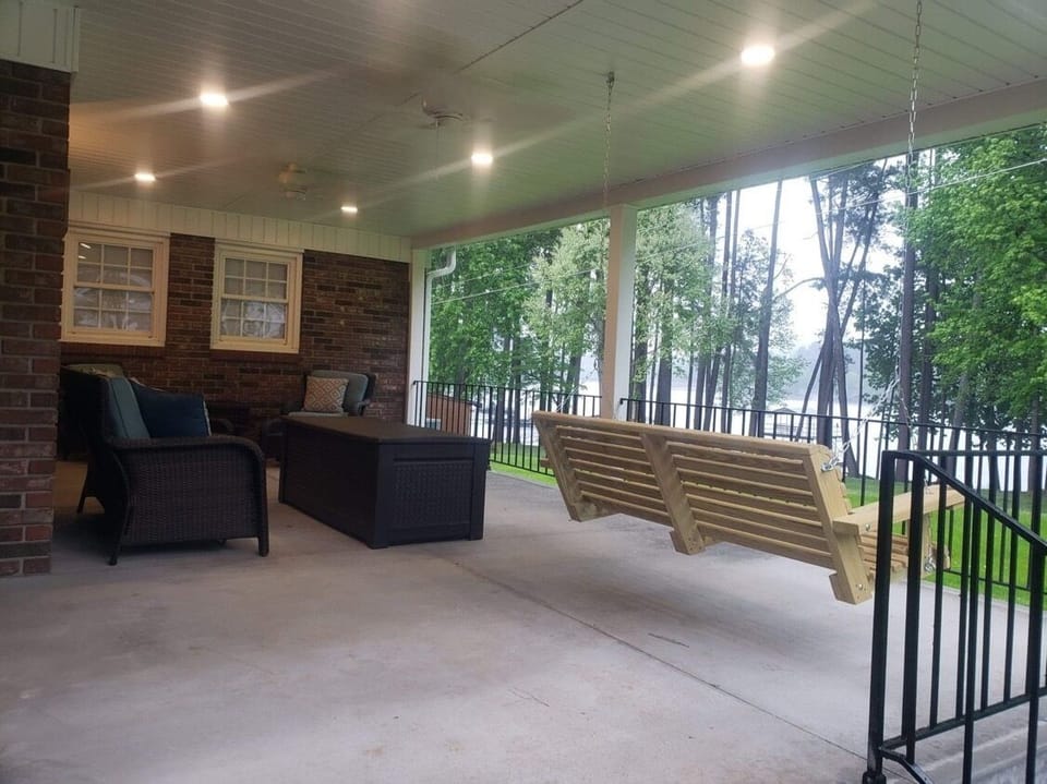 Beautiful covered deck overlooking the lake