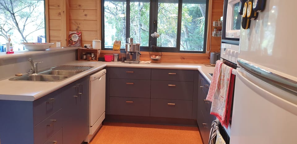 Kitchen with coffee machine