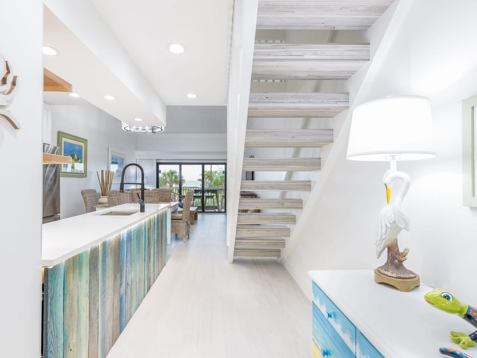 Flow from kitchen to living spaces for effortless entertaining.