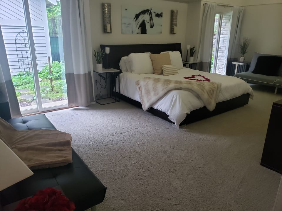 Master has two patio doors leading to a private garden area