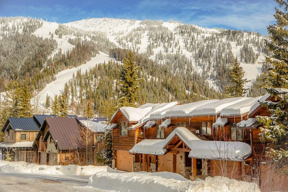 Exterior of the property during winter with amazing view of Whitefish Mountain Resort