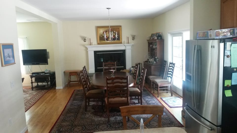 Dining room with fireplace seating for 10 guests.