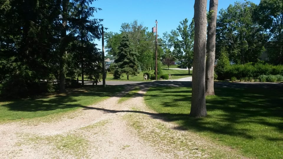 Down the driveway and across the road are white sandy beaches and yacht club.