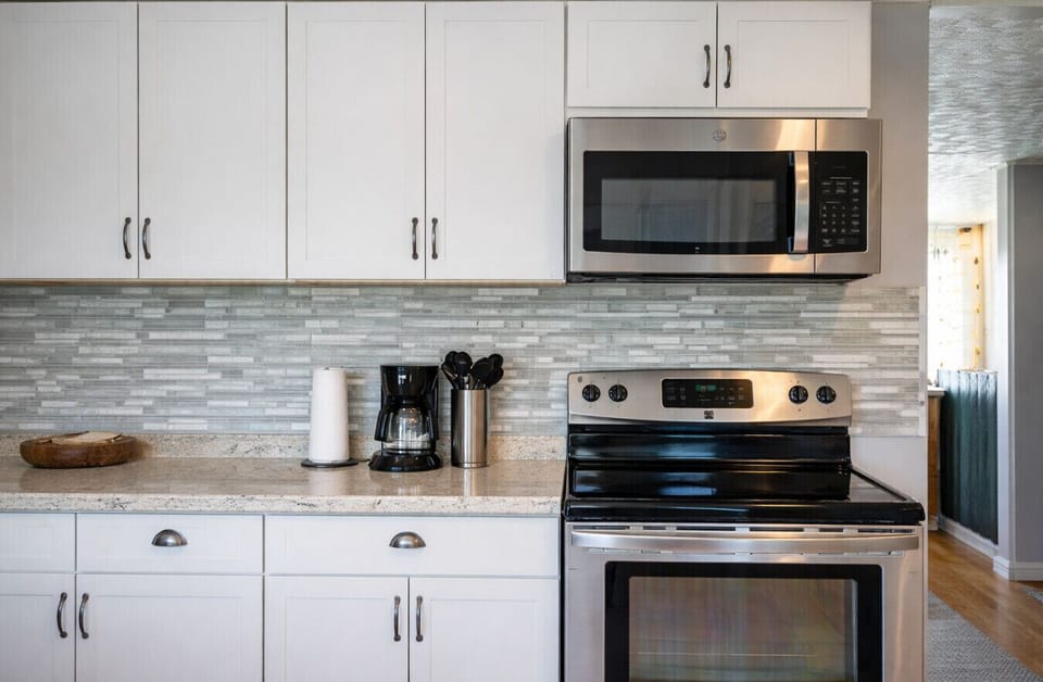 Kitchen with modern appliances, clean design, and functional layout.