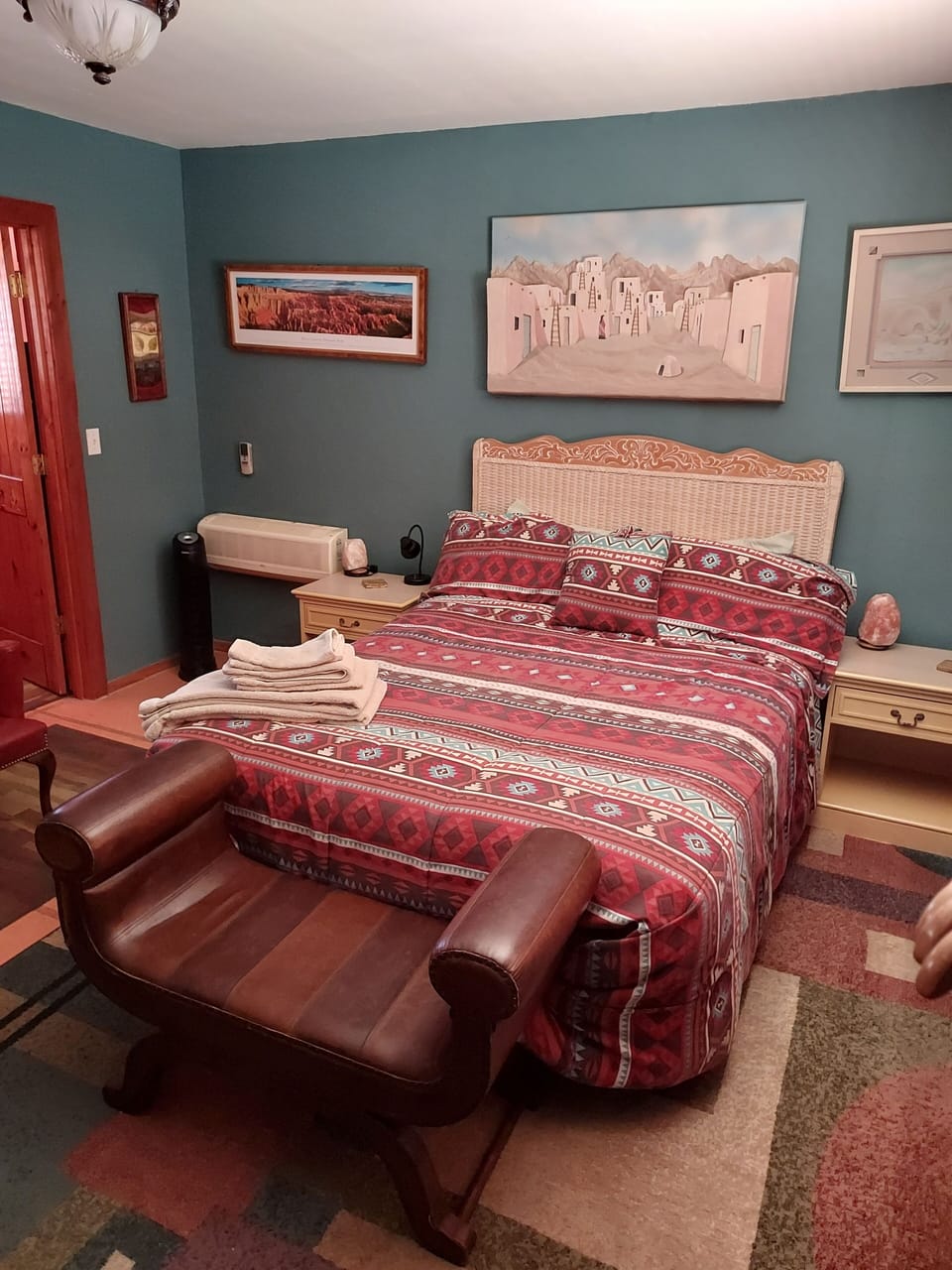 Queen sized bed. Heating and Air-conditioning unit.