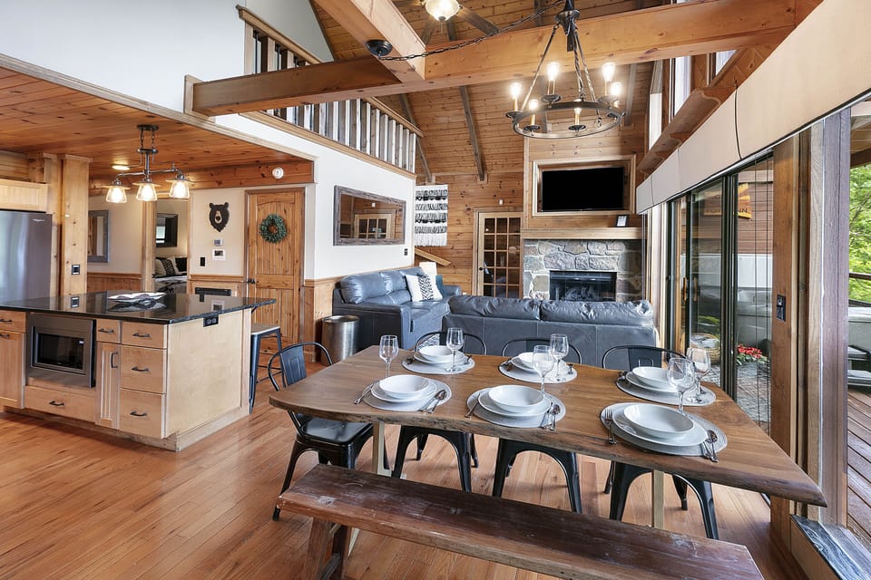 Open concept main floor dining, kitchen, living room w/electric fireplace