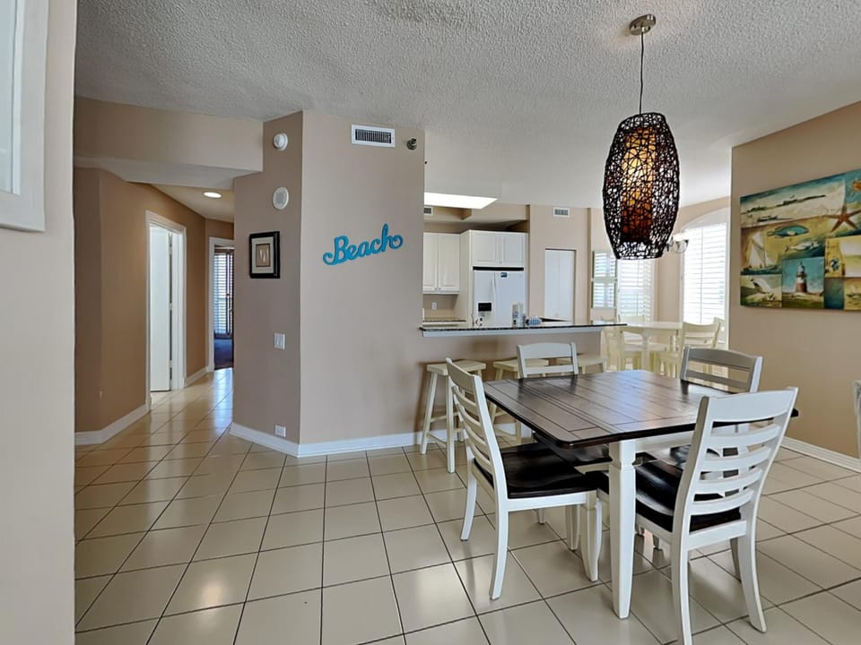 Dining Area - Table Seats 4, Breakfast Bar Seats 3