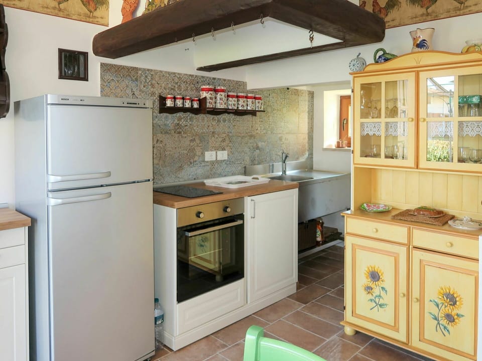 Cabinetry, Countertop, Property, Building, Kitchen Appliance, Kitchen, Gas Stove, Kitchen Stove, Home Appliance, Wood
