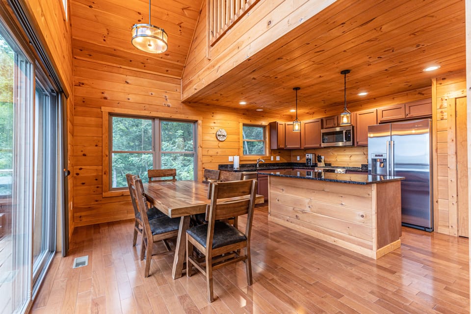 Kitchen with granite counters and Bosch appliances including gas grill