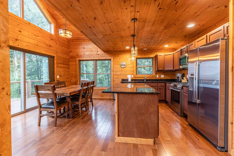 Kitchen with granite counters and Bosch appliances including gas grill