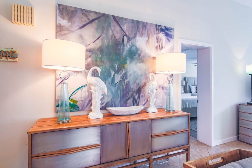 The doorway to the guest suite is located near the living room and dining area.