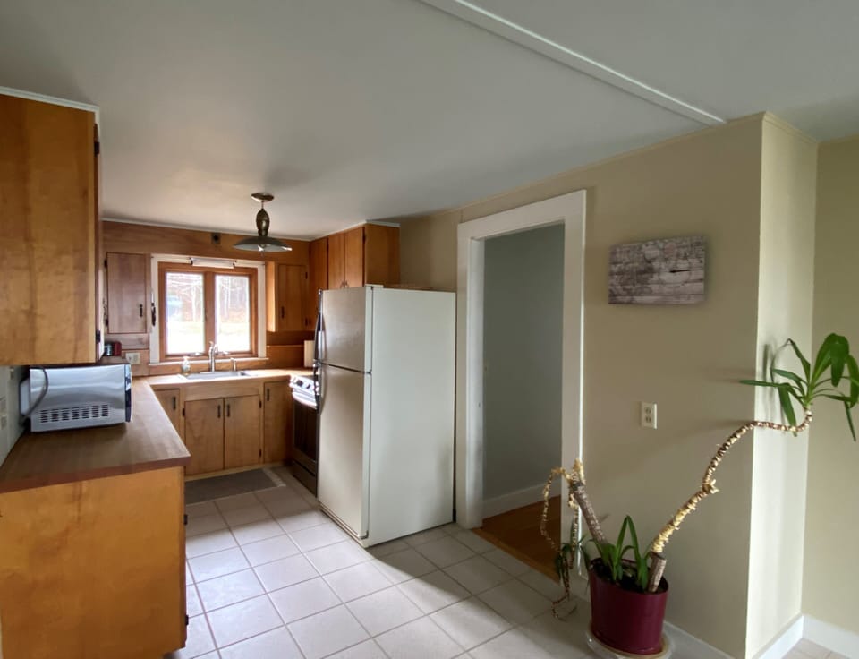 Fully equipped kitchen with everything you might need; including a lobster pot.