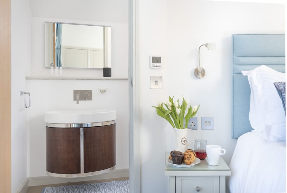 Harbour Master's House, Portreath. Second floor: Master bedroom with en-suite