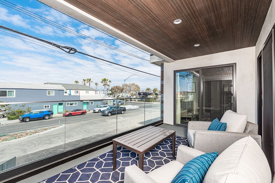 Primary bedroom and the second guest bedroom includes sliding glass door that leads to second floor sun deck.
                