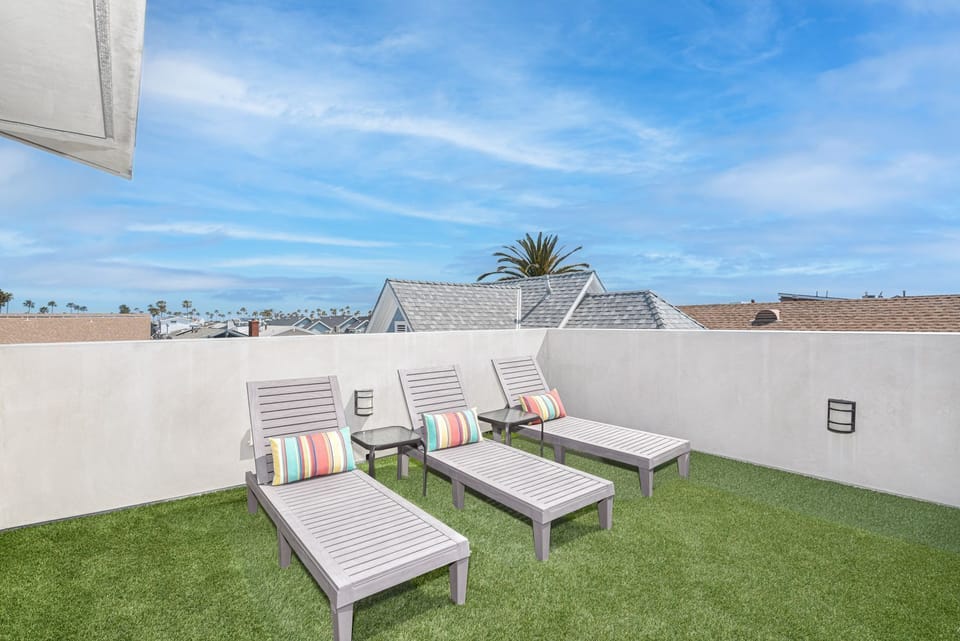Rooftop deck is accessed through the fourth bedroom
                