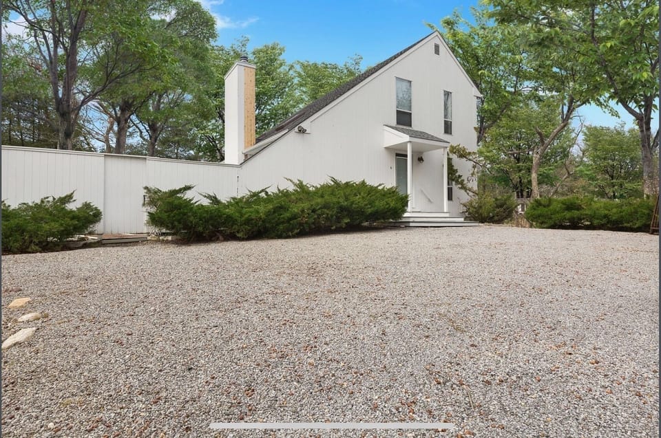 Large driveway with parking area
