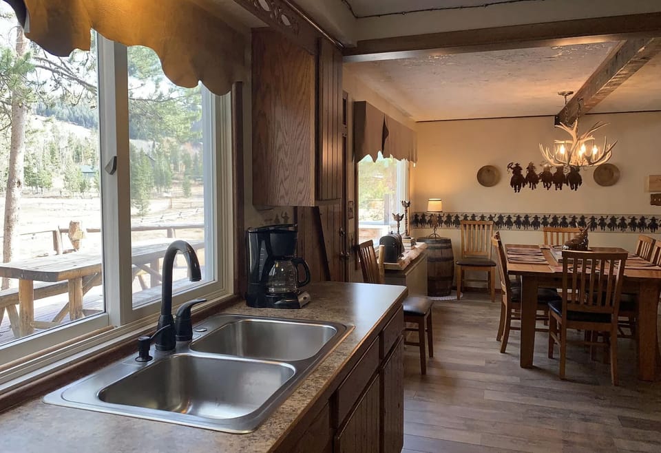 Kitchen view of meadow and deck