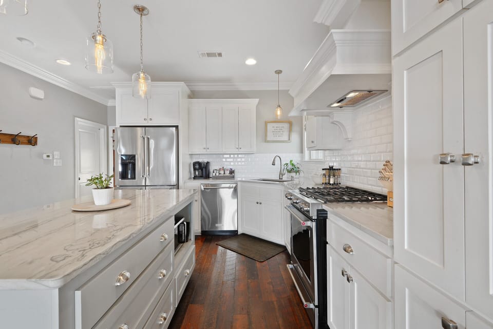 Kitchen equipped with 5 Burner Gas Range.  Coffee and seasoning are available