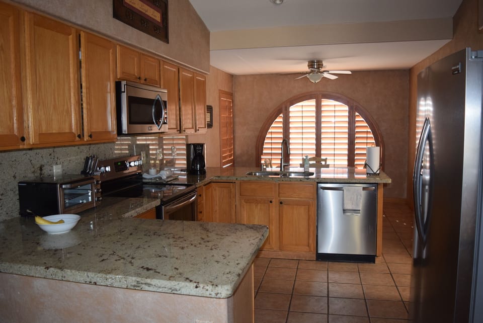 Kitchen is comfortable, roomy and nicely stocked w/ cooking and baking equipment