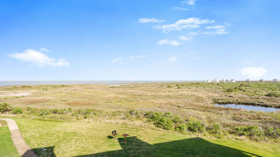 View from balcony.  Community charcoal grill below.